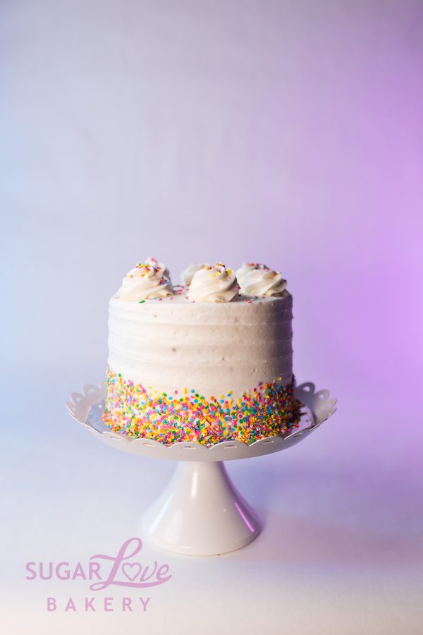 Vanilla Funfetti Cake on Cake Stand at Sugar Love Bakery in Slidell